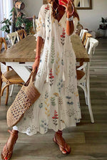 Robe maxi de vacances à fleurs et franges amples