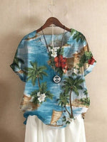 Blouse décontractée bleue imprimée hawaïenne à col rond