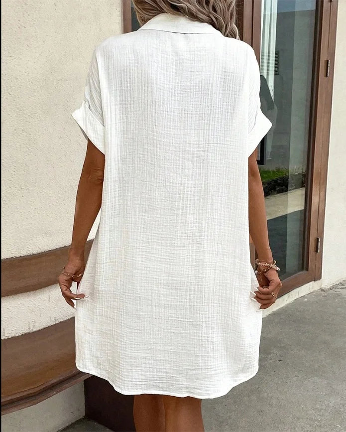 White Textured Shirt Collar Single Breasted Rolled Short Sleeve Pocket Loose Mini Shirt Dress For Women