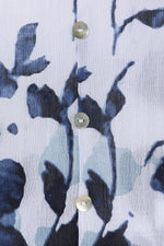 Ärmelloses Shirt in Übergröße mit weißem Blumenmuster