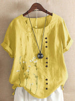 T-shirt à manches courtes, col rond et boutons à imprimé floral