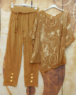 Ensemble deux pièces à imprimé abstrait, ourlet asymétrique et manches mi-longues