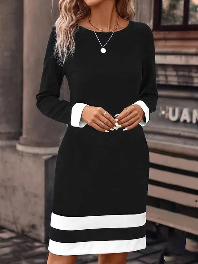 Robe t-shirt midi trapèze à manches longues, col rond et coutures contrastées, idéale pour le printemps et l'automne.