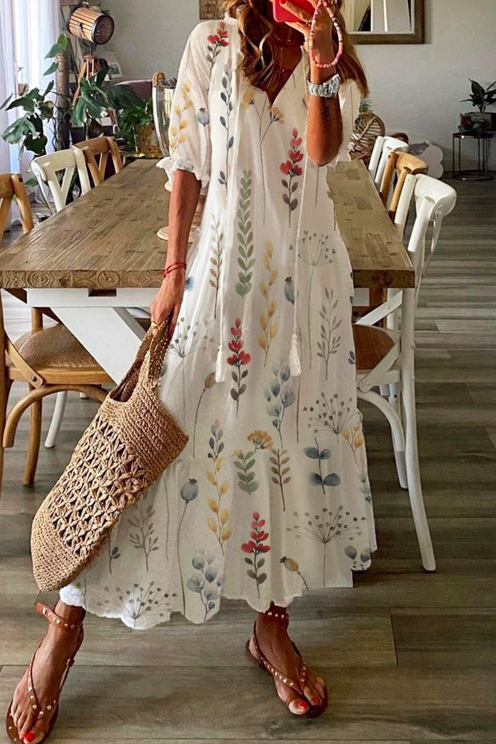 Robe maxi de vacances à fleurs et franges amples