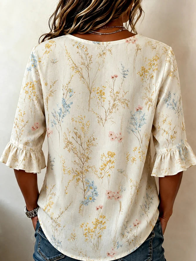 Off White Wild Floral V Neck Three Wooden Button Ruffle Half Sleeve Loose Blouse With Side Pockets
